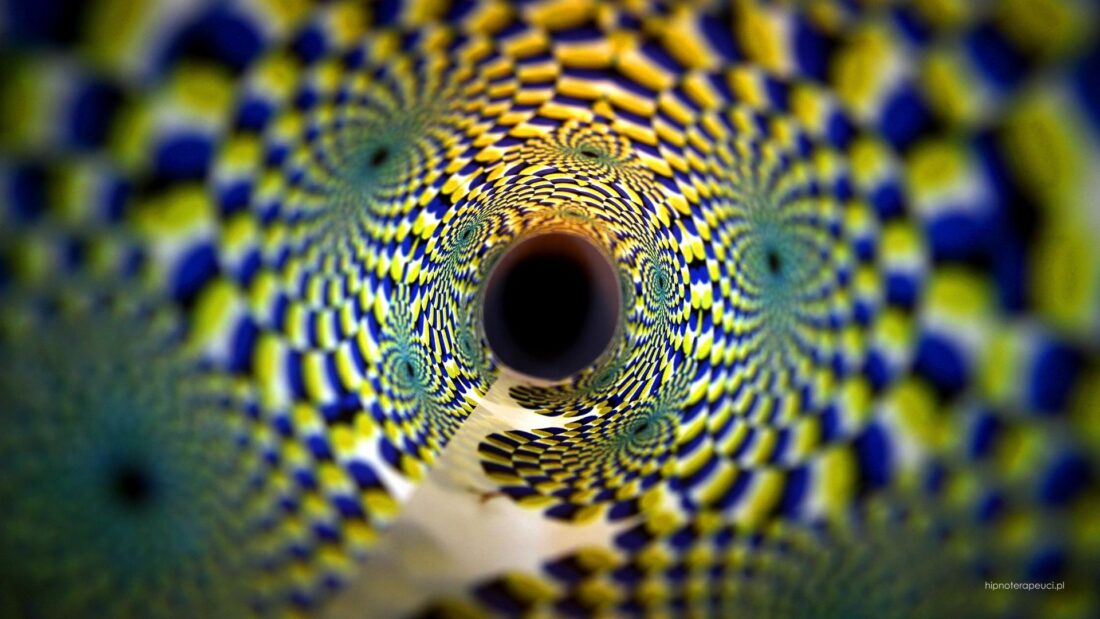 Abstrakcyjny spiralny wzór jako symbol transu hipnotycznego, zawężenia uwagi i zmienionego przetwarzania bodźców.